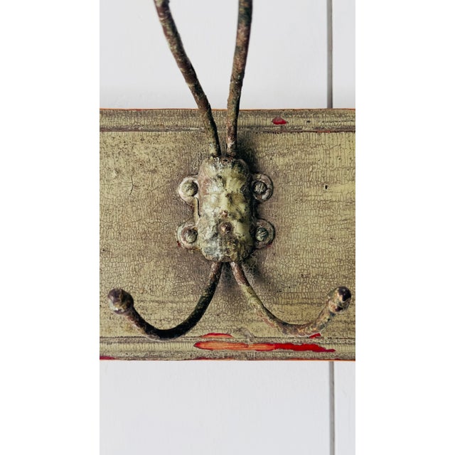 vintage metal hooks on lovely old painted board, circa 1900. great condition and patina, lots of character. 30.5 long x...
