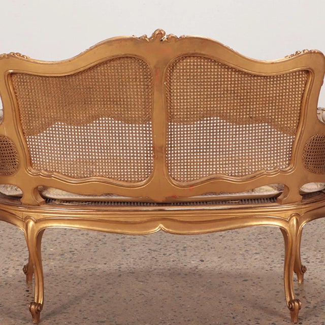 Gold A Giltwood and Carved French Louis XV Style Settee. Circa 1900 For Sale - Image 8 of 9
