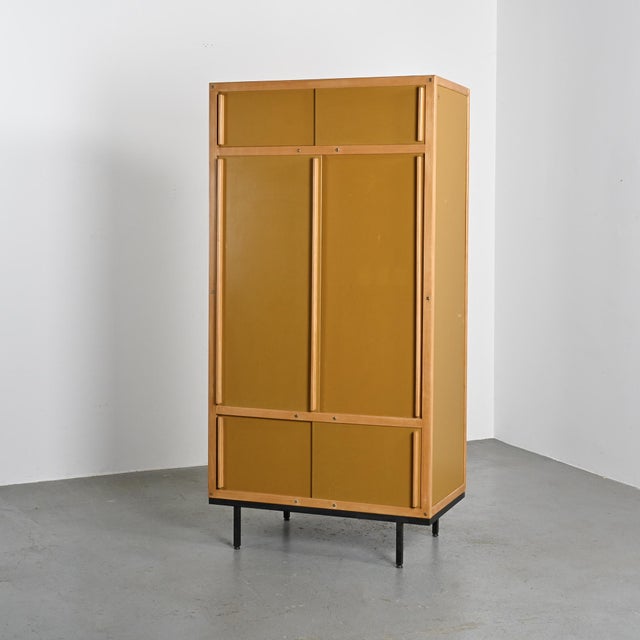 Vintage wardrobe with a modernist and minimalist style by André Sornay, a Lyon-based cabinetmaker and designer, produced...