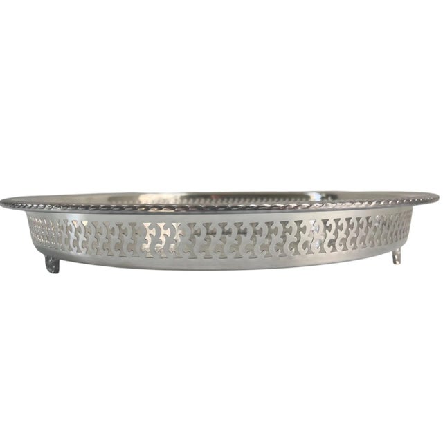 Vintage beautifully etched Rogers silver-plate footed gallery tray with intricate detailed interior supported by feet...