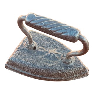 Vintage Cast Iron Sad Flat Iron Bookend For Sale
