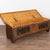 The painted finish is all original on this rustic pine flat top narrow trunk which may also serve as a bench. Flowers were...