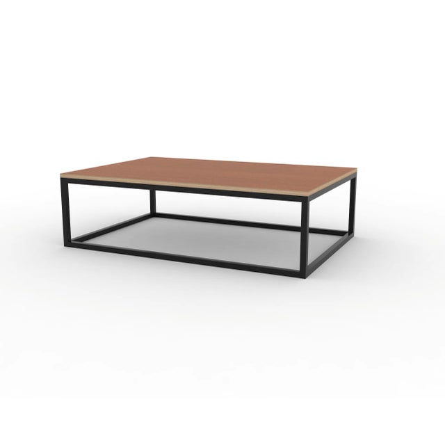 <p><em>Underline</em> coffee table, produced&nbsp;by CRP.XPN, is made of cherry veneered laminated wood on a steel...