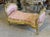Stunning lovely pink bench/settee. This is fully refinished in gold and tufted in high end designer fabric. The frame has...