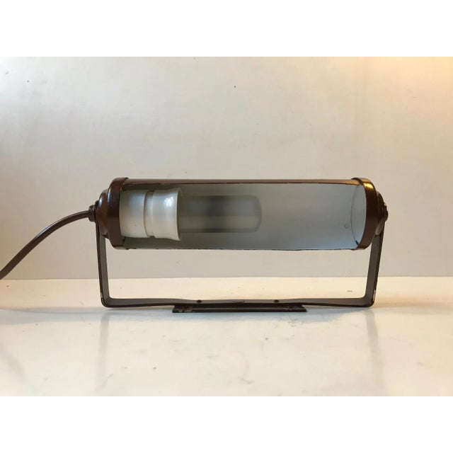 Elegantly constructed Sconce - Wall Light manufactured by Lyfa in Denmark during the 1930s. It displays a Danish take on...