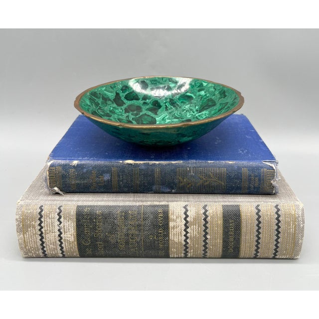 Gorgeous, polished malachite trinket bowl or vide poche. This piece is striking with its stunning green swirl pattern...