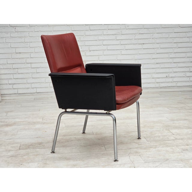 1970s, Danish design by Arne Vodder. Easy chair, furniture leather, chrome steel, wood. Original good condition: no...