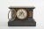 Black marble with gilt brass face details Ansonian mantel / desk clock. The clock is in great antique condition. Minor...