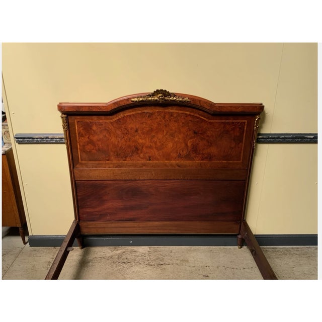 Age: circa 1910 Wood type: Veneered hardwoods such as rosewood with inlays and bronze embellishments Condition: Very good,...