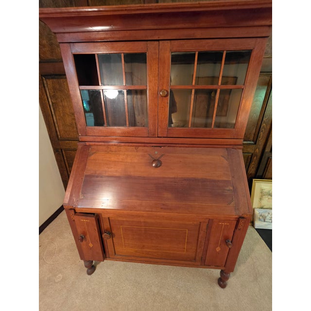 An exceptional and rare piece of Early American vernacular furniture, a modern day working home sculpture. This slant-...