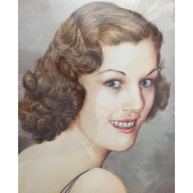 This is a gorgeous portrait of a lovely woman with a typical 1930s hairstyle. It’s been carefully preserved with a frame...