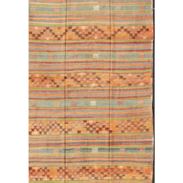 Geometric stripe design Kilim in multi-colors, rug tu-ned-25, country of origin / type: Turkey / Kilim, circa 1950 This...