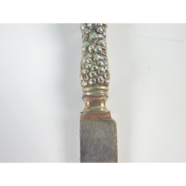 Early 20th century Stieff Silversmith heavily repoussed Rose pattern youth or butter knife. Monogramed RDK, sterling mark...