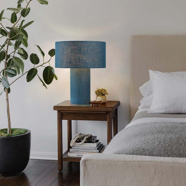 The Moonlight Table Lamp by Nova of California is a contemporary designer lighting piece that blends sculptural form with...