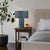 The Moonlight Table Lamp by Nova of California is a contemporary designer lighting piece that blends sculptural form with...