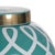 A midsize ginger jar featuring an elongated graceful geometric design in metallic satin gold with a coordinating lid...