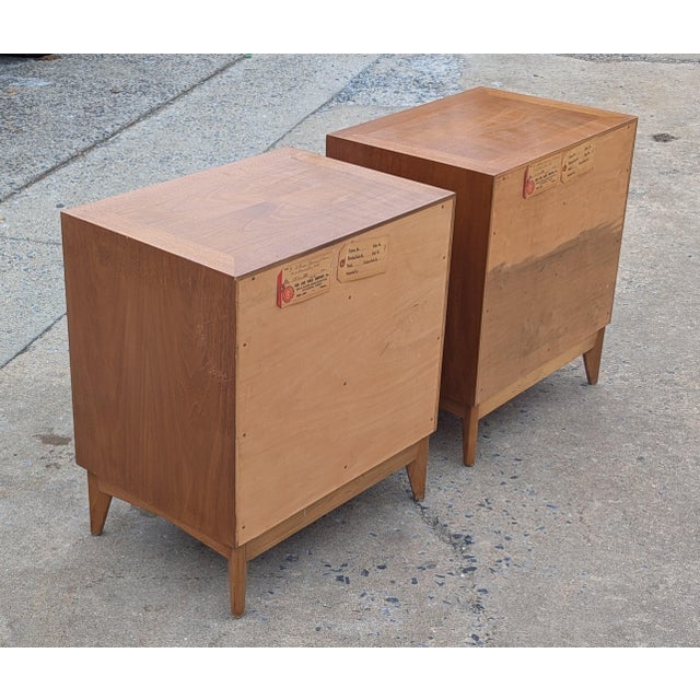Pair of classical American Mid-Century Modern wooden night stands / bedside tables with three drawer and Brass handle by...