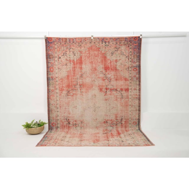 Vintage Hand-Knotted runner rug is a semi-antique vintage area rug. The '70s Eastern region of Anatolia's unique rug is...