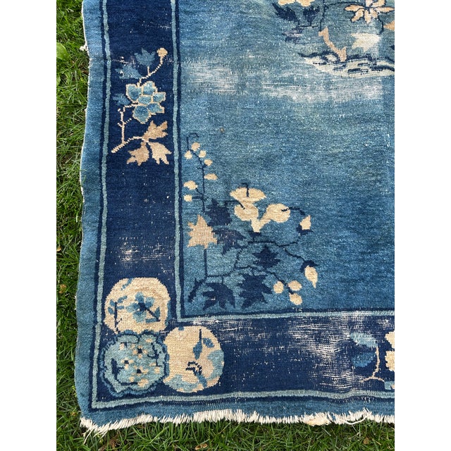 An early 20th century art deco rug in beautiful shades of blue and floral motif Nichols Maker