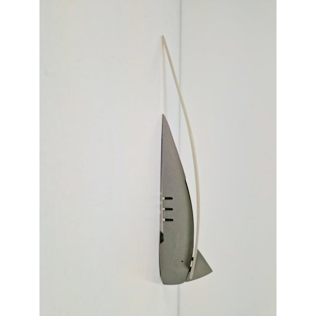 "zebulon" wall lamp by studio zebulon for maison lucien gau pari '80 this unique object is the "zebulon" wall lamp, a rare...