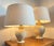 Stunning pair of vintage lamps by the renowned manufacturer 'maison le dauphin’ (france). these elegant lamps are made of...