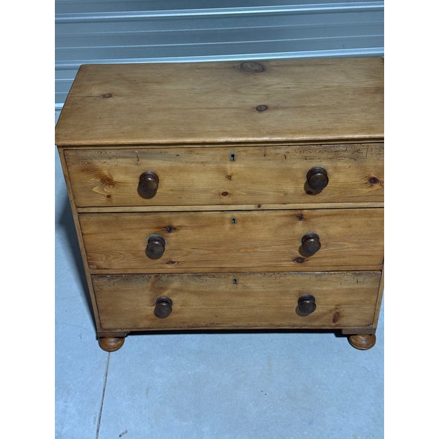 Antique Pine Three Drawers - Chest of Drawers From England We found this three drawer chest in northeastern England. There...