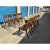 Klismos solid walnut dining chairs. The chairs are made of solid walnut with a satin finish and leather cording. The...