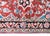 This mid-20th-century Persian Heriz rug features a bold, geometric medallion design characteristic of the Northwest...