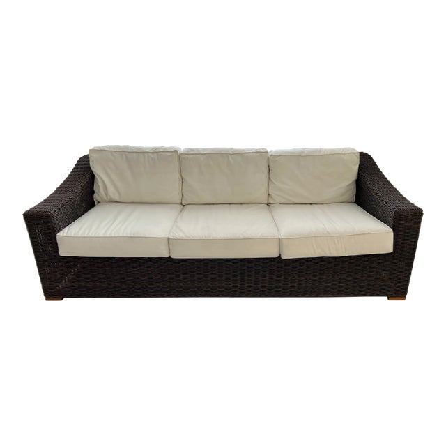 Vintage Brown Weaved Couch With White Cushions For Sale