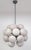 Italian sputnik chandelier with 24 cream pebble shaped Murano glass shades mounted on black powder coat finish frame /...