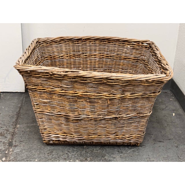 Design Plus Gallery presents a Vintage French Woven Wicker Basket by Gander & White. This large basket has a rectangular...