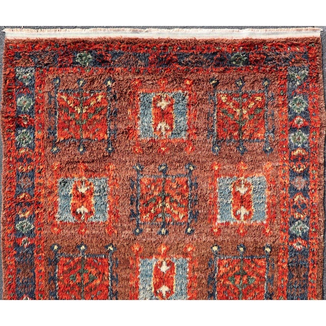 Measures: 6'8 x 8'8 Vintage Turkish Tulu Rug with Bold Red Field and Blue Geometric Motifs. Keivan Woven Arts / Rug...