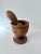 A well crafted wooden Folk Art Mortar and Pestle. The piece is used for crushing everything from herbs and spices, to...