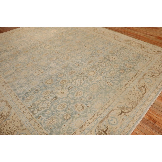An early 20th-century light blue and tan Persian Malayer Rug Details rug no. j3321 size 10' 10" x 13' 3" (330 x 404 cm