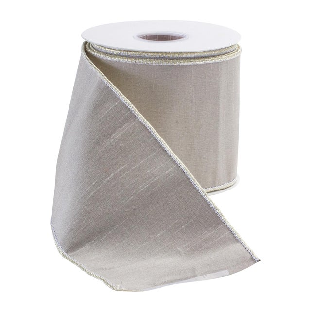 Add a touch of elegance to your holiday decorating and crafts with this 4" x 10-yard Beige Wired Polyester Ribbon. Crafted...