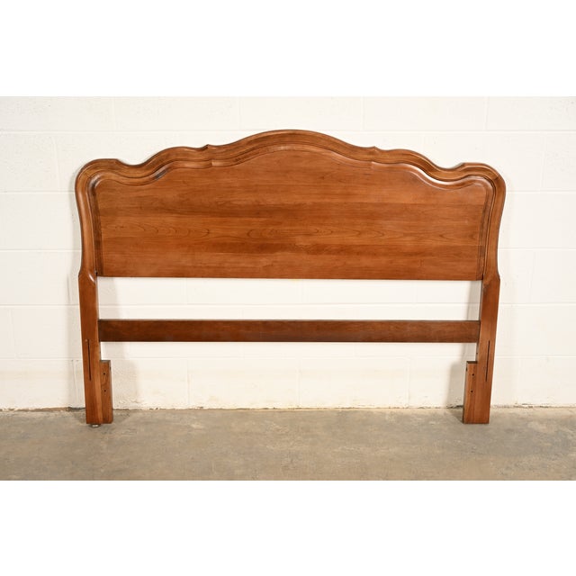 A gorgeous French Provincial Louis XV style full size headboard By Kindel Furniture USA, Circa 1960s Measures: 56.5"W x...
