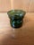 This set of 9 vintage Dansk green glass candle holders was designed by Jens Quistgaard in the 1960s. Quistgaard is often...