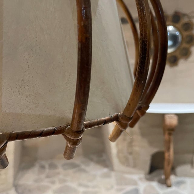 AMBIANIC presents Sculptural French Bamboo Lamp Pendant, France circa 1950s Unsigned. It requires a bayonet bulb. 21 tall...