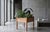 Solid oak planter stand attributed to Danish designer Henning Kjærnulf, produced in Denmark during the 1960s. The piece...