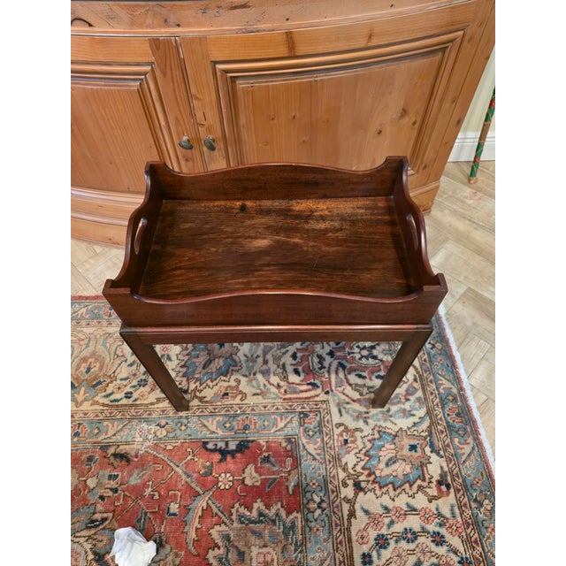 Mahogany Tray Top Table on later base. The Tray measures 22"w by 13.75"d by 4.3"h..