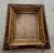 exquisite burled wood Eastlake Victorian picture frame, 1890s, carved floral design at corners, inset with layers of...
