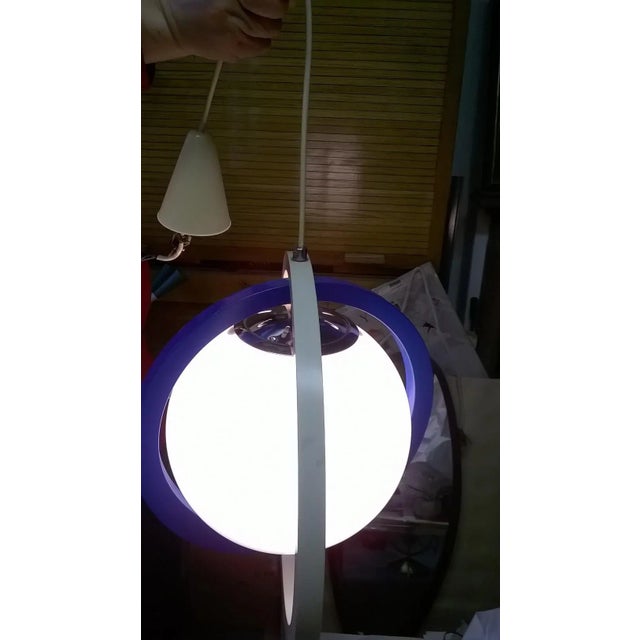 Space Age italian pendant lamp,1960s. Rings in painted wood and globe in opaline glasss. Unknown designer. This piece is...