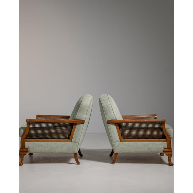 A captivating pair of French armchairs from the 20th century, these pieces embody the Eclectic movement's spirited...
