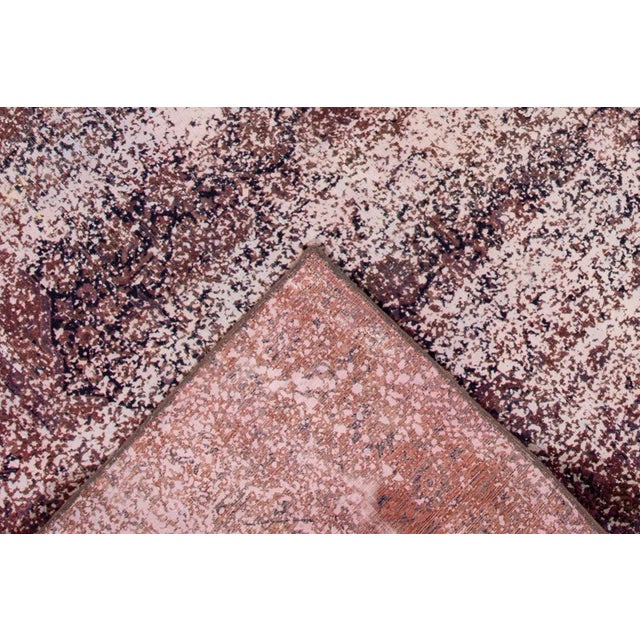 Vintage hand-knotted Overdyed rug with an all over motif. This piece has great detailing and a beautiful design. It would...