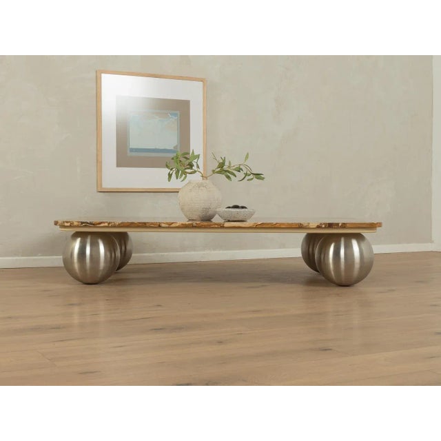 Exclusive coffee table from the 1960s with an onyx tabletop in cream, gray, and brown tones and new ball feet made of...