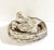 Two resting birds nestle together within a rustic twig nest in this charming vintage concrete garden sculpture. Richly...