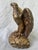 Elegant, heavy, vintage solid bronze eagle figurine. Standing on rocks with his beautiful wings spread. Can also be used...