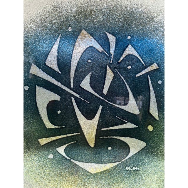 An exceptional 1950s glass plate by Master Craftsman Maurice Heaton which features a dynamic boomerang-like design. This...