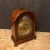 Fine English Georgian style mahogany Bracket clock. Tempus fugit face with cherubs spandrels, Roman numerals. Sold thru...