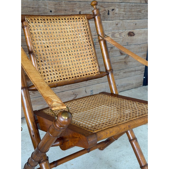 McGuire Mid-20th Century English Campaign Faux Bamboo Folding Sling Armchairs With Cane Seats – Pair For Sale - Image 4 of 12